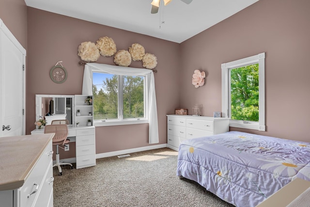7910 Stony Lake Rd, Jackson, MI 49201 - bedroom featuring light carpet, a desk, baseboards, and a ceiling fan