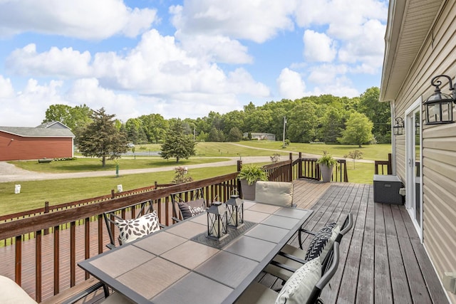 7910 Stony Lake Rd, Jackson, MI 49201 - wooden terrace with outdoor dining space and a yard