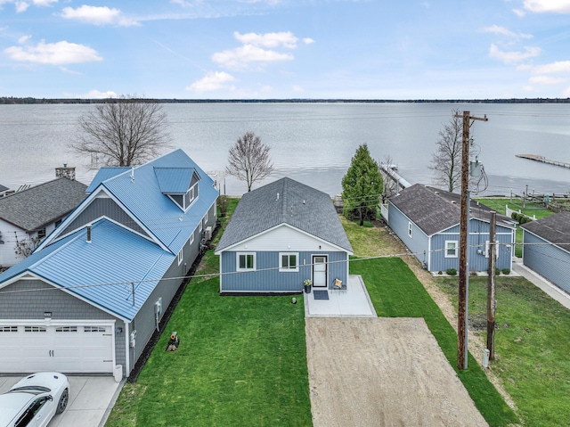 3551 W W Lake Mitchell Dr, Cadillac, MI 49601 - aerial view of property and surrounding area with a large body of water