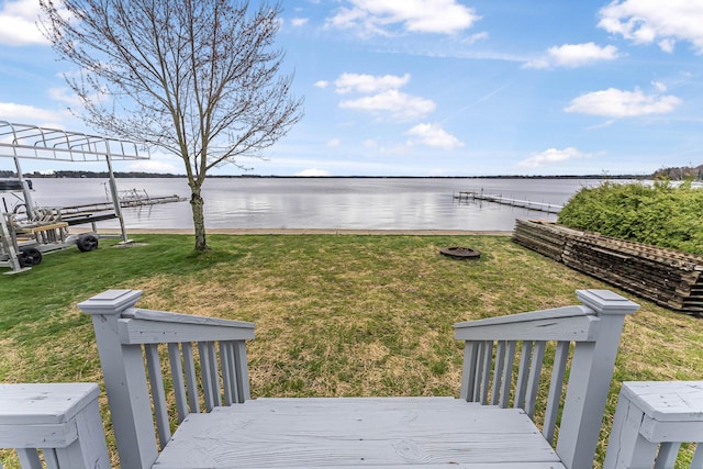 3551 W W Lake Mitchell Dr, Cadillac, MI 49601 - view of grassy yard featuring a water view