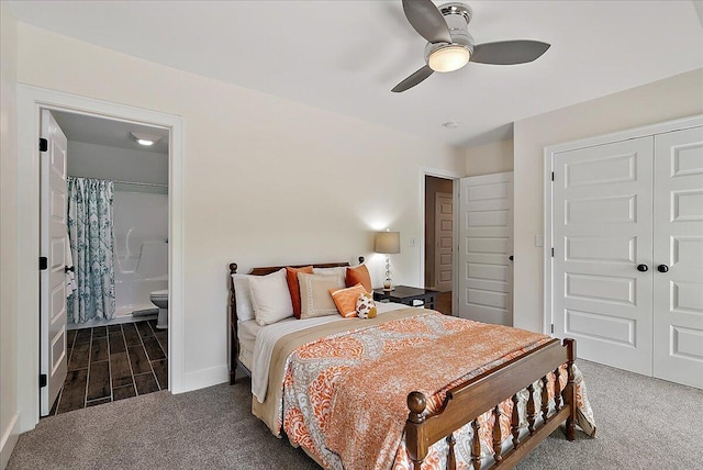 2582 3 Mile Rd NE, Grand Rapids, MI 49525 - bedroom with carpet flooring, a closet, baseboards, a ceiling fan, and connected bathroom