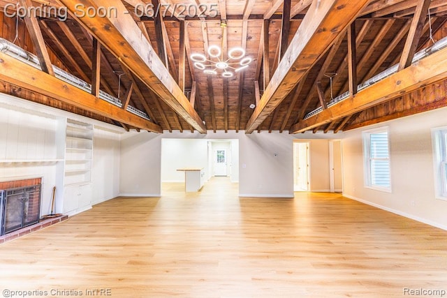 50824 Baltimore St, New Baltimore, MI 48047 - unfurnished living room featuring a chandelier, wood finished floors, baseboards, a brick fireplace, and beam ceiling