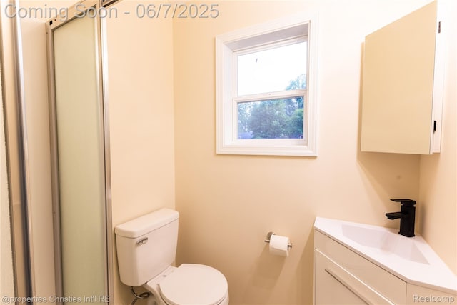 50824 Baltimore St, New Baltimore, MI 48047 - bathroom with toilet, vanity, and a shower with shower door