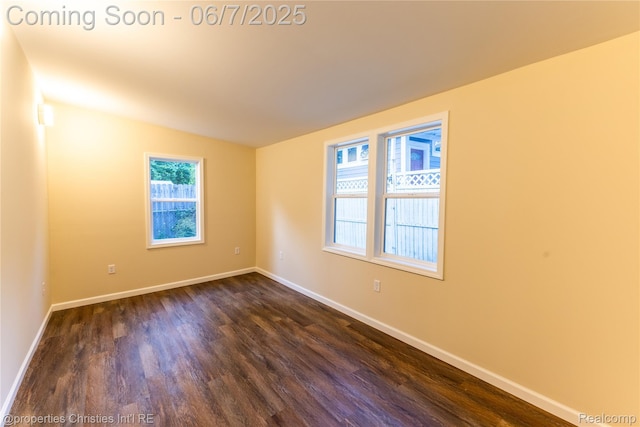 50824 Baltimore St, New Baltimore, MI 48047 - spare room with dark wood-style floors and baseboards