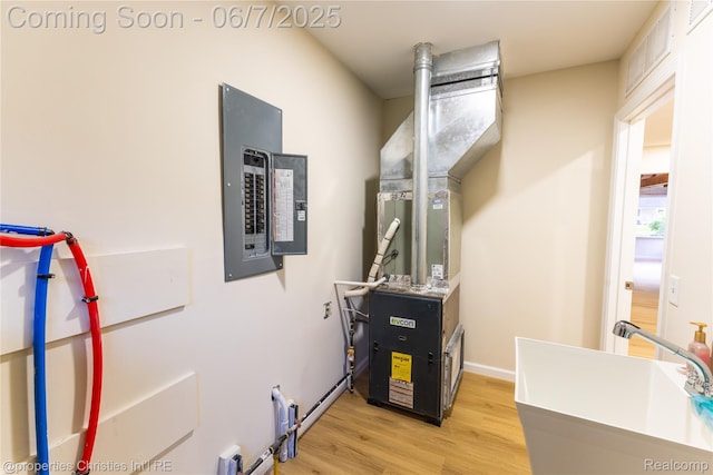 50824 Baltimore St, New Baltimore, MI 48047 - utilities with electric panel and a sink