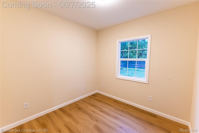 50824 Baltimore St, New Baltimore, MI 48047 - unfurnished room featuring light wood finished floors and baseboards