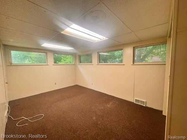 20951 Nummer St, Warren, MI 48089 - unfurnished room with dark colored carpet and healthy amount of natural light