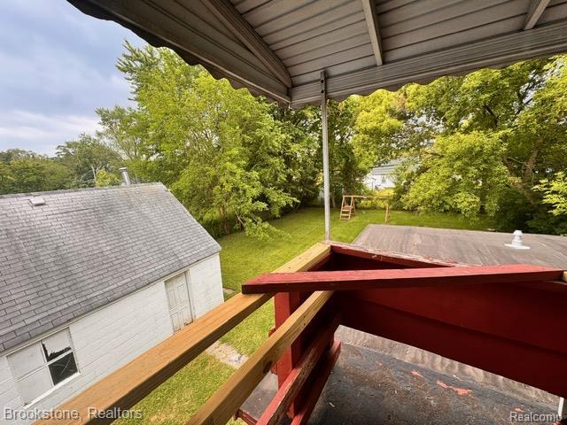 20951 Nummer St, Warren, MI 48089 - wooden terrace featuring a lawn