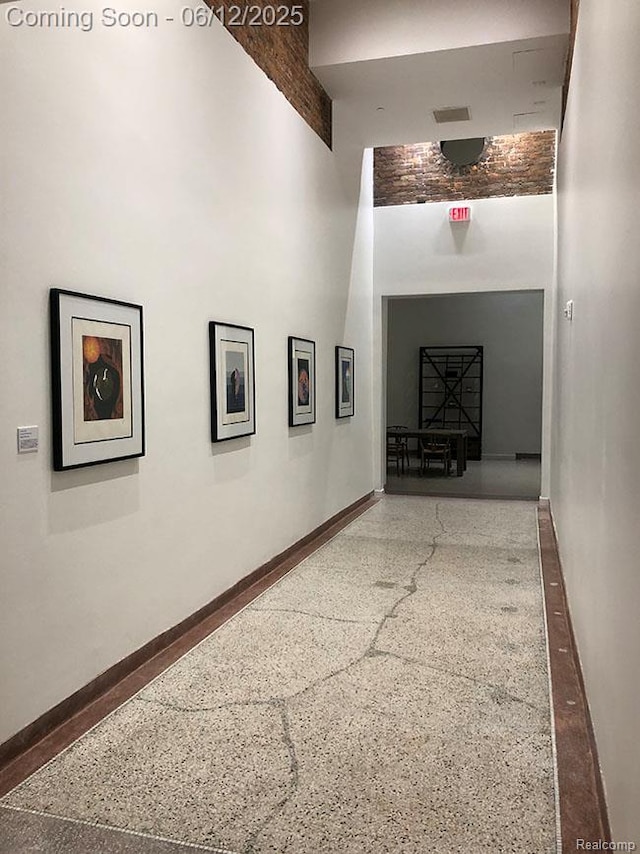 1454 Townsend St Unit 101, Detroit, MI 48214 - hallway with baseboards and a high ceiling