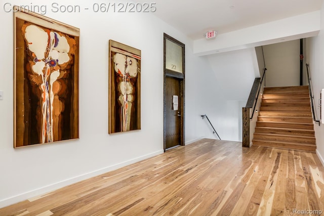 1454 Townsend St Unit 101, Detroit, MI 48214 - foyer entrance with wood finished floors and baseboards