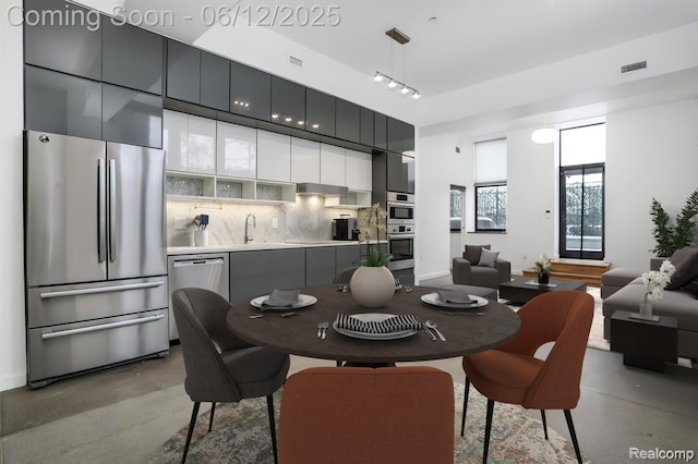1454 Townsend St Unit 101, Detroit, MI 48214 - dining space with finished concrete floors and baseboards