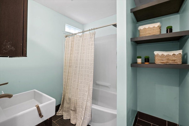 950 Crescent St NE, Grand Rapids, MI 49503 - bathroom featuring a sink and shower / bath combo