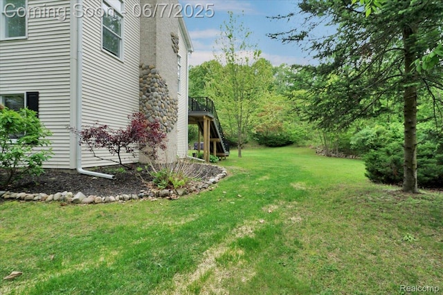16146 Valcrest Dr, Linden, MI 48451 - view of grassy yard with a deck