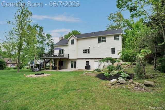 16146 Valcrest Dr, Linden, MI 48451 - rear view of house with stairs, a deck, a yard, and a chimney