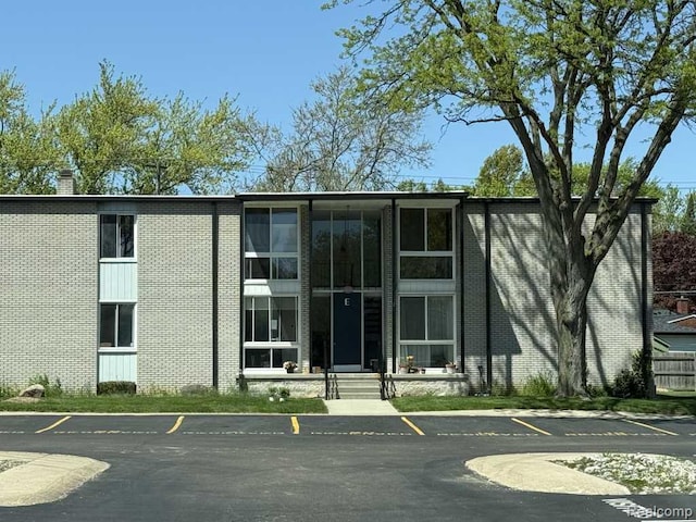 4030 W 13 Mile Rd, Lathrup Village, MI 48073 - view of building exterior featuring uncovered parking