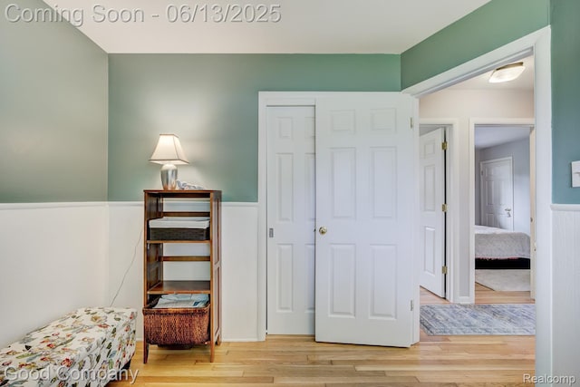 4217 Crooks Rd, Royal Oak, MI 48073 - sitting room with wood finished floors and a wainscoted wall