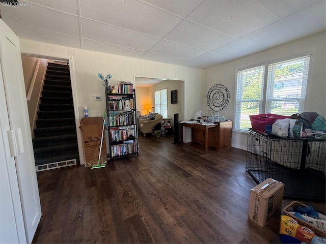 18 Park St, Oxford, MI 48371 - office space featuring dark wood-style flooring, healthy amount of natural light, and a paneled ceiling