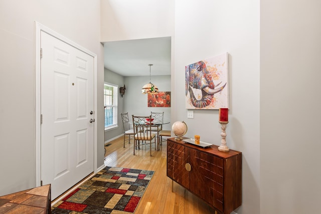 6018 Augusta Ct, Grand Blanc, MI 48439 - entrance foyer with light wood-style floors and baseboards