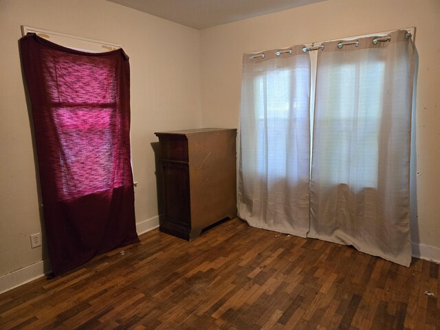 804 17th St, Jackson, MI 49203 - spare room with wood finished floors and baseboards