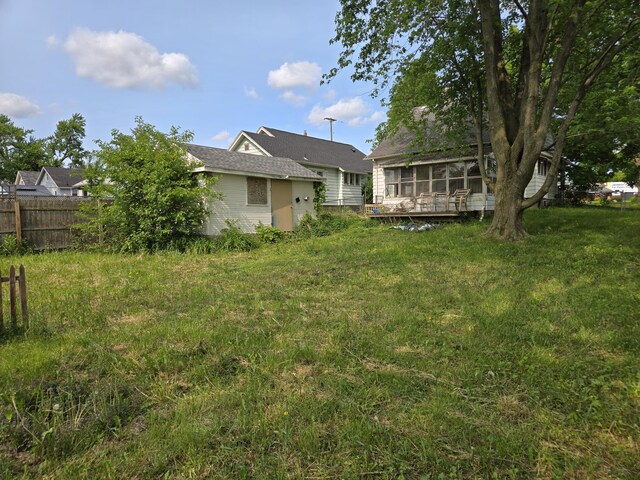 804 17th St, Jackson, MI 49203 - view of yard featuring a sunroom