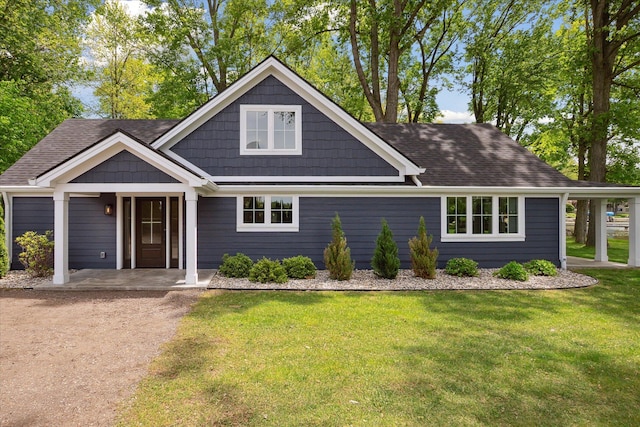5150 Redding Dr, Pinckney, MI 48169 - view of front of house with a front yard and a shingled roof