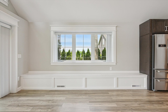 5150 Redding Dr, Pinckney, MI 48169 - unfurnished dining area with vaulted ceiling and light wood-type flooring