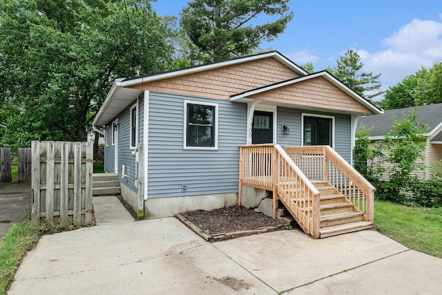 1700 Bristol Ave NW, Grand Rapids, MI 49504 - view of front of home featuring a patio area