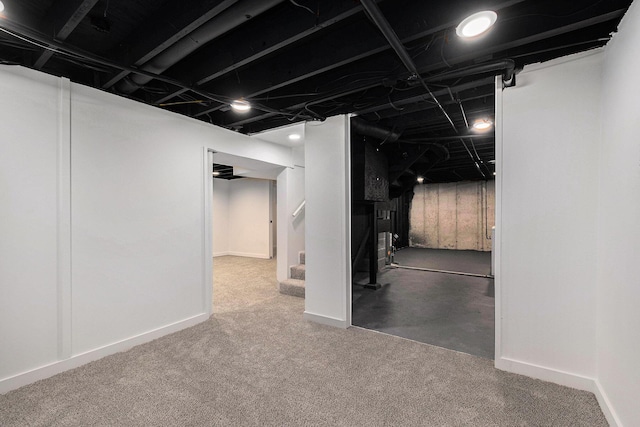1700 Bristol Ave NW, Grand Rapids, MI 49504 - finished below grade area featuring stairs and carpet