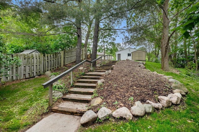 1700 Bristol Ave NW, Grand Rapids, MI 49504 - view of yard featuring an outbuilding and stairway