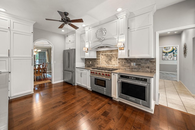 33081 Old Post Rd, Niles, MI 49120 - kitchen with high end appliances, a ceiling fan, baseboards, white cabinets, and recessed lighting