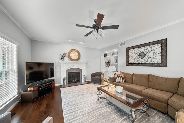 33081 Old Post Rd, Niles, MI 49120 - living room featuring plenty of natural light, a ceiling fan, dark wood-style flooring, baseboards, and ornamental molding