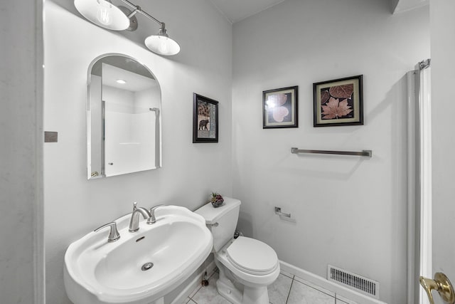 33081 Old Post Rd, Niles, MI 49120 - full bathroom with a sink, toilet, a shower, tile patterned floors, and baseboards