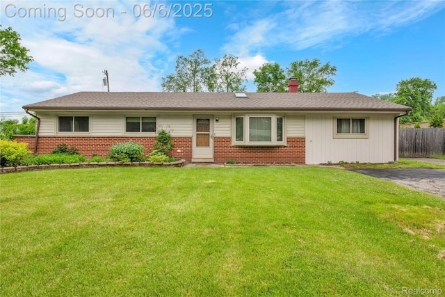 6927 Snow Apple Dr, Clarkston, MI 48346 - ranch-style home featuring brick siding and a chimney