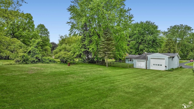 9730 Douglas Rd, Temperance, MI 48182 - view of yard with a garage and an outdoor structure