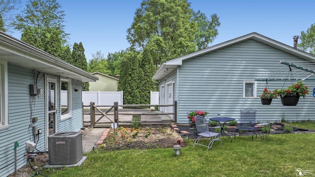 9730 Douglas Rd, Temperance, MI 48182 - view of property exterior featuring cooling unit and a gate