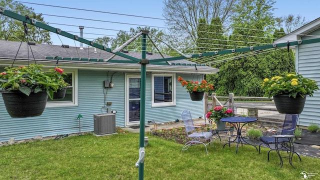 9730 Douglas Rd, Temperance, MI 48182 - rear view of property with cooling unit and a yard