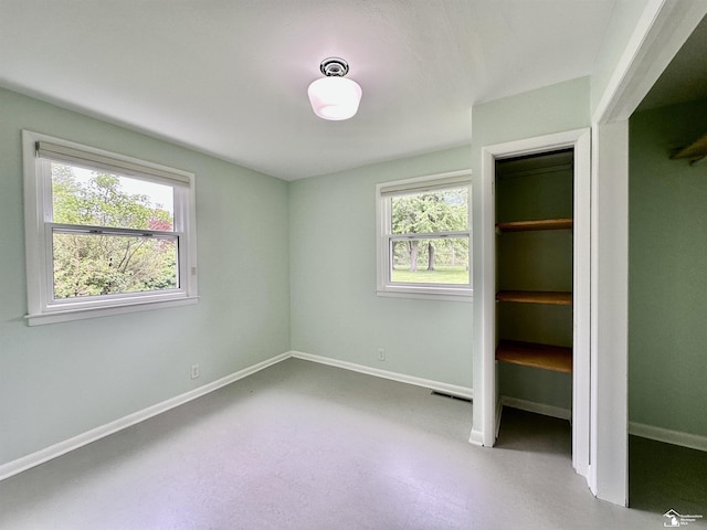 9730 Douglas Rd, Temperance, MI 48182 - unfurnished bedroom featuring baseboards