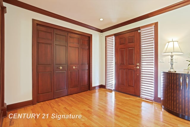 12 W Corral Dr, Saginaw, MI 48638 - entrance foyer with light wood-type flooring, baseboards, ornamental molding, and recessed lighting