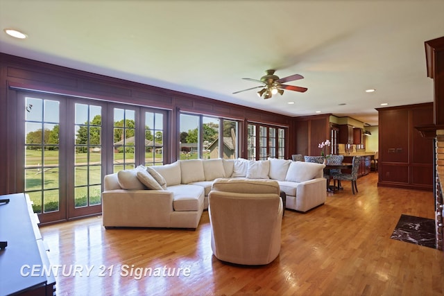 12 W Corral Dr, Saginaw, MI 48638 - living room with healthy amount of natural light, ceiling fan, light wood-type flooring, and recessed lighting