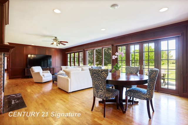 12 W Corral Dr, Saginaw, MI 48638 - dining space featuring crown molding, light wood-style floors, ceiling fan, recessed lighting, and a decorative wall