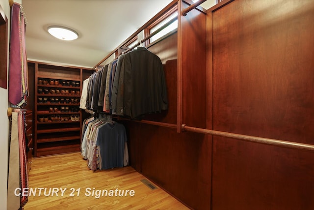 12 W Corral Dr, Saginaw, MI 48638 - walk in closet featuring wood finished floors