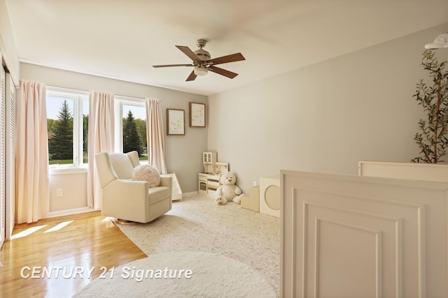 12 W Corral Dr, Saginaw, MI 48638 - bedroom with wood finished floors, ceiling fan, and baseboards