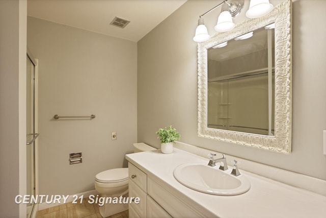 12 W Corral Dr, Saginaw, MI 48638 - bathroom featuring a shower with door, toilet, and vanity