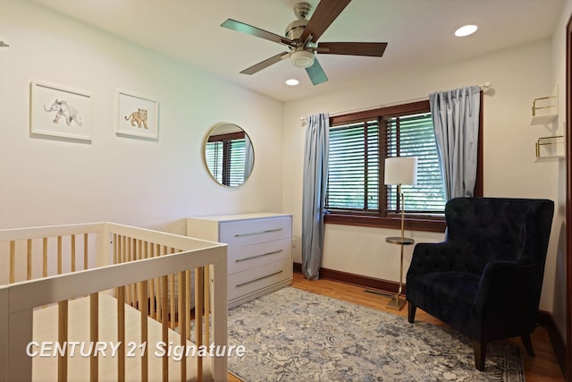 12 W Corral Dr, Saginaw, MI 48638 - bedroom with multiple windows, light wood finished floors, baseboards, recessed lighting, and a ceiling fan