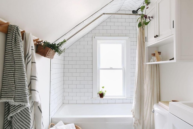 1550 Pine Ave NW, Grand Rapids, MI 49504 - full bath with plenty of natural light, shower / bath combination with curtain, and toilet