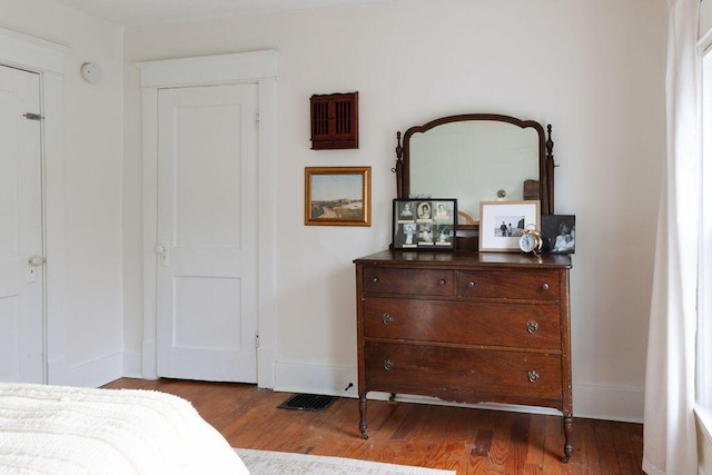 1550 Pine Ave NW, Grand Rapids, MI 49504 - bedroom featuring wood finished floors and baseboards