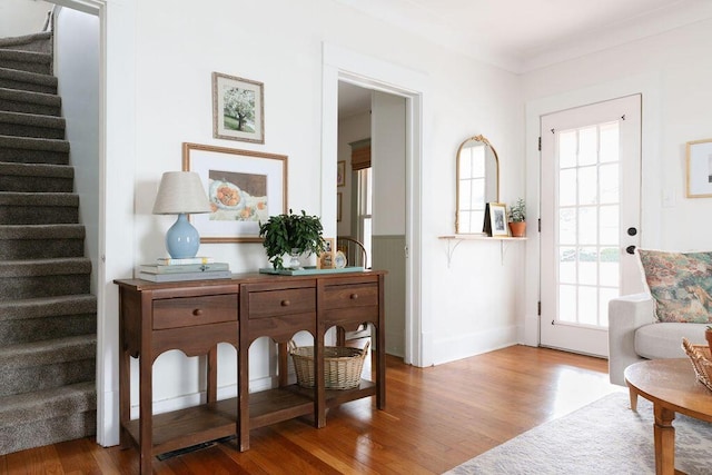 1550 Pine Ave NW, Grand Rapids, MI 49504 - foyer with stairway, wood finished floors, and plenty of natural light