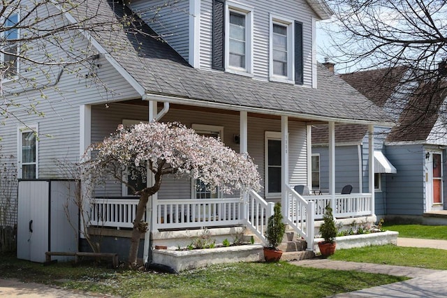 1550 Pine Ave NW, Grand Rapids, MI 49504 - view of front of house with covered porch and roof with shingles