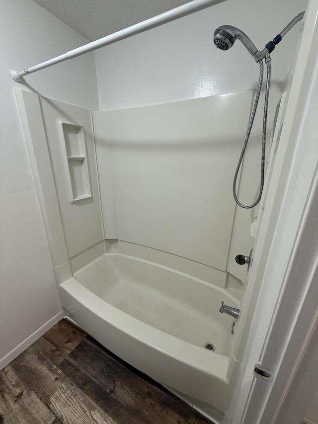 106 S Berkley St, Kalamazoo, MI 49006 - full bath featuring wood finished floors and tub / shower combination