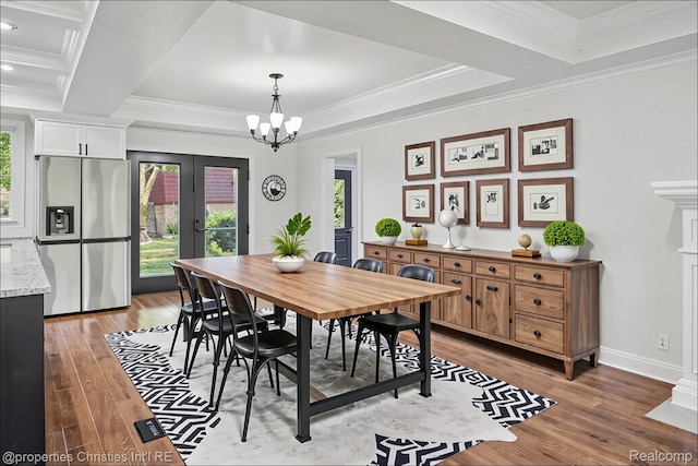 18051 Locherbie Ave, Beverly Hills, MI 48025 - dining area featuring french doors, light wood-style flooring, ornamental molding, a chandelier, and baseboards